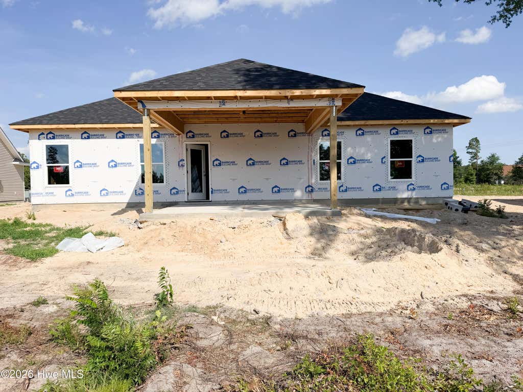 Photo of 1068 Wood Creek Road NE, Leland, NC 28451 (MLS # 100584980)