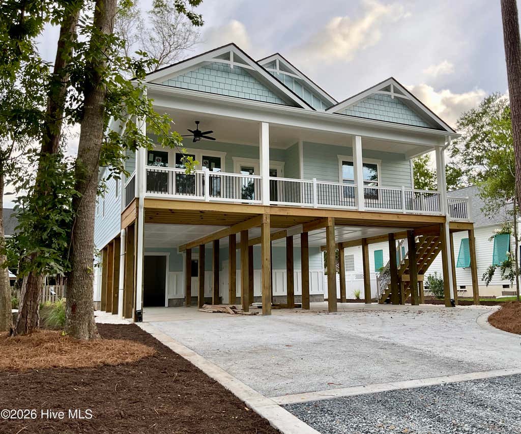 Photo of 5605 E Yacht Drive, Oak Island, NC 28465 (MLS # 100594769)