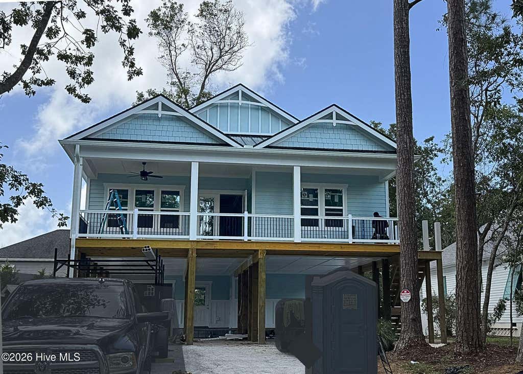 Photo of 5605 E Yacht Drive, Oak Island, NC 28465 (MLS # 100594769)
