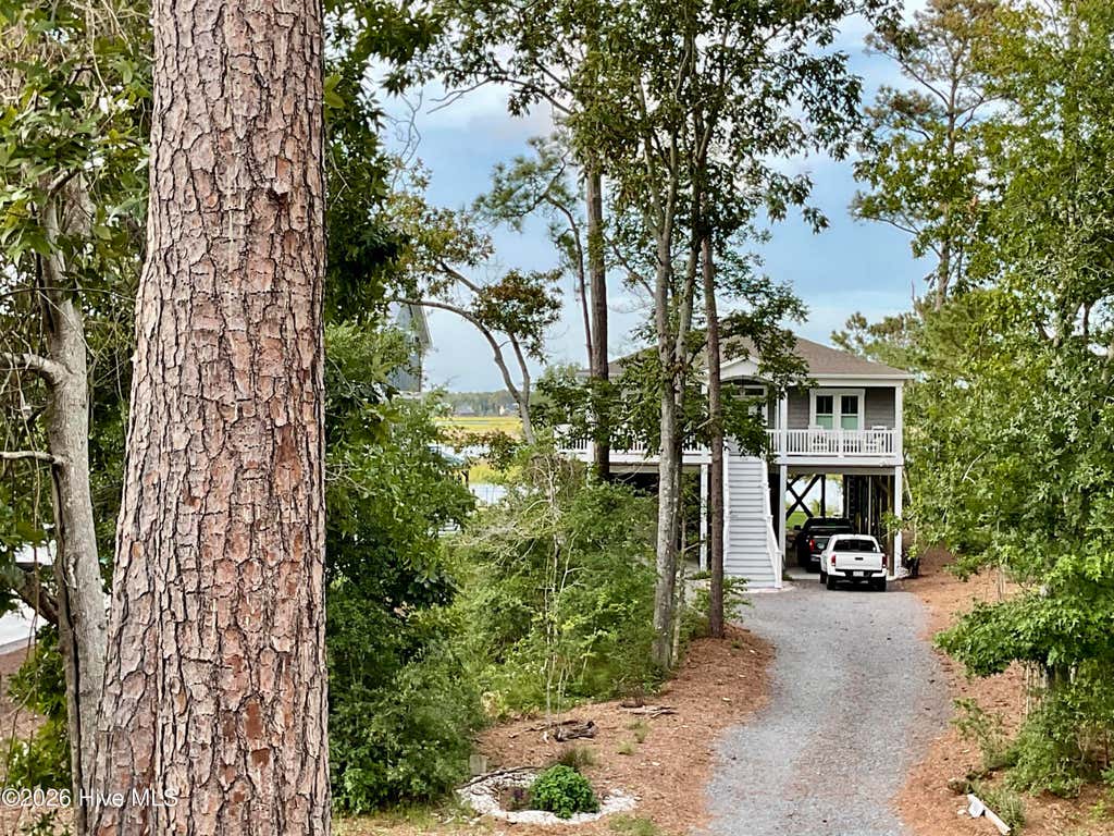 Photo of 5605 E Yacht Drive, Oak Island, NC 28465 (MLS # 100594769)