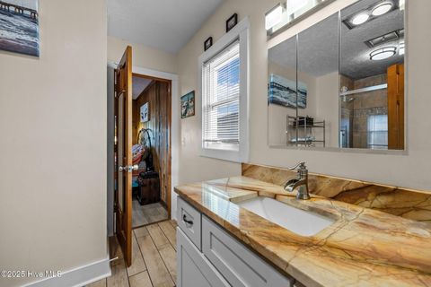 Tiny photo for 142 Greensboro Street, Holden Beach, NC 28462 (MLS # 100545181)