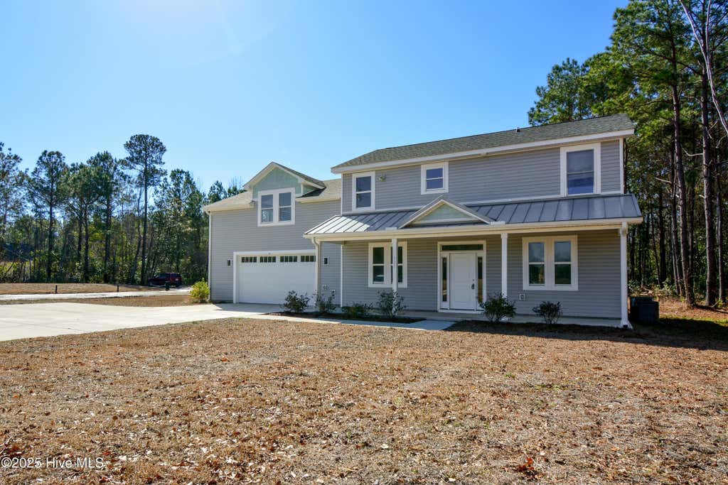Photo of 320 Belt Road, Hampstead, NC 28443 (MLS # 100589699)