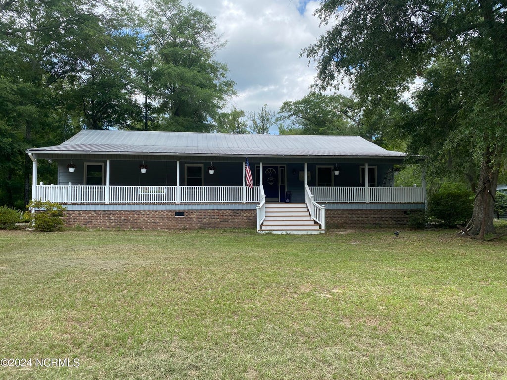 Photo of 6692 Confederate Drive NE, Leland, NC 28451 (MLS # 100598629)