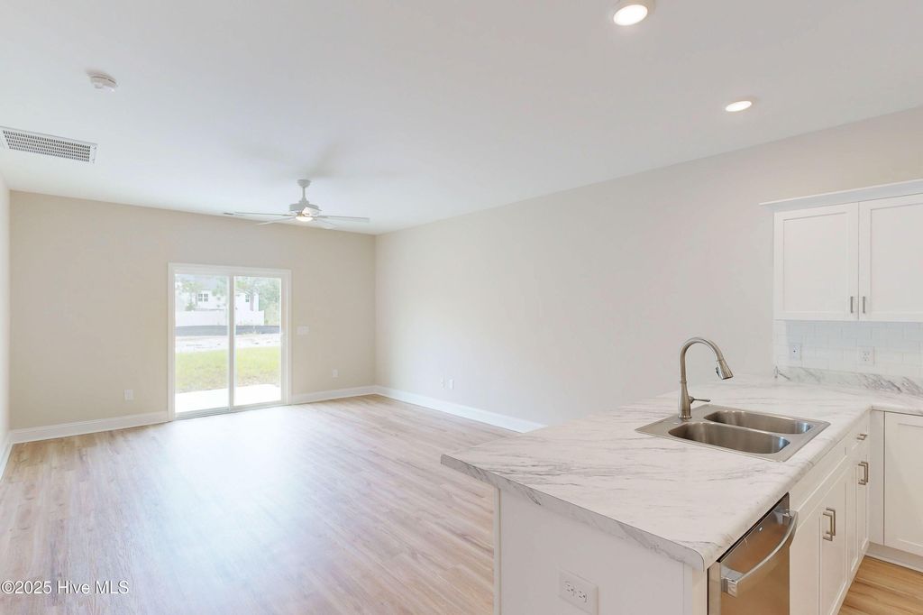 Photo of 209 Sandpiper Place, Holly Ridge, NC 28445 (MLS # 100493013)