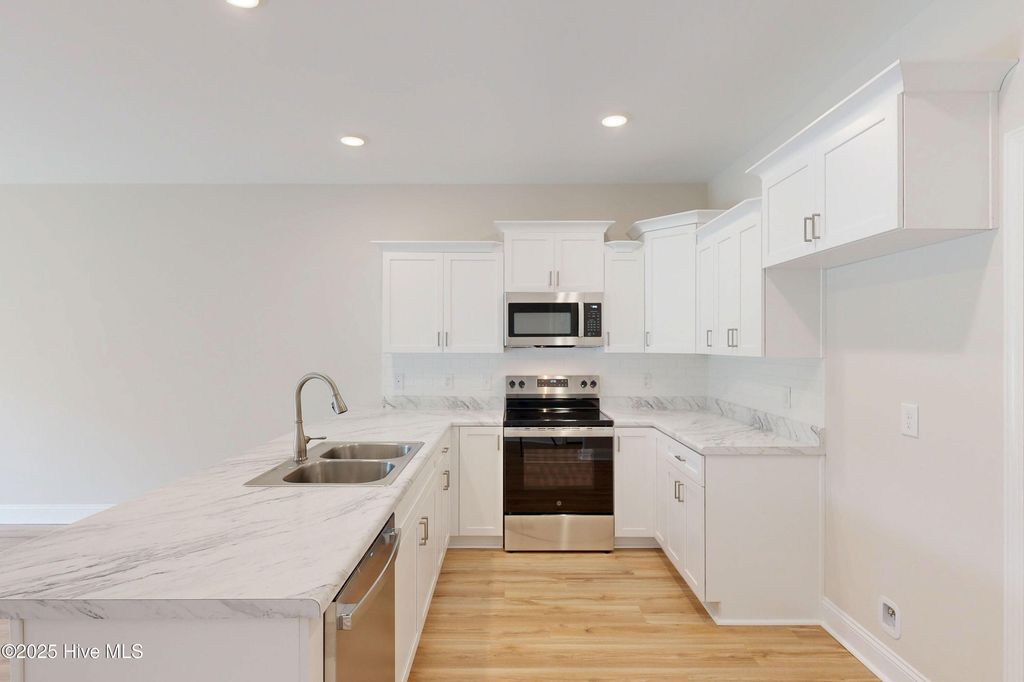 Photo of 209 Sandpiper Place, Holly Ridge, NC 28445 (MLS # 100493013)