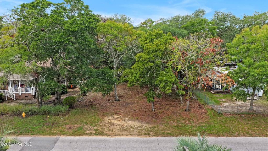 Photo of 115 NE 79th Street, Oak Island, NC 28465 (MLS # 100599888)