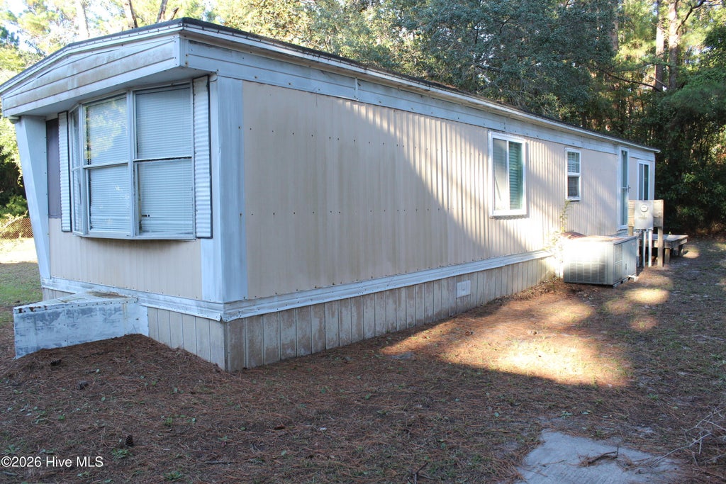 Photo of 7147 Dale Avenue SW, Ocean Isle Beach, NC 28469 (MLS # 100606776)