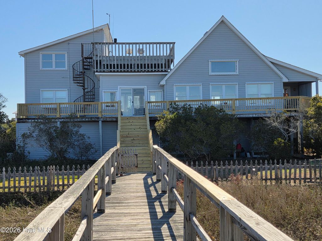 Photo of 3608 Shoreline Drive, Oak Island, NC 28465 (MLS # 100557343)