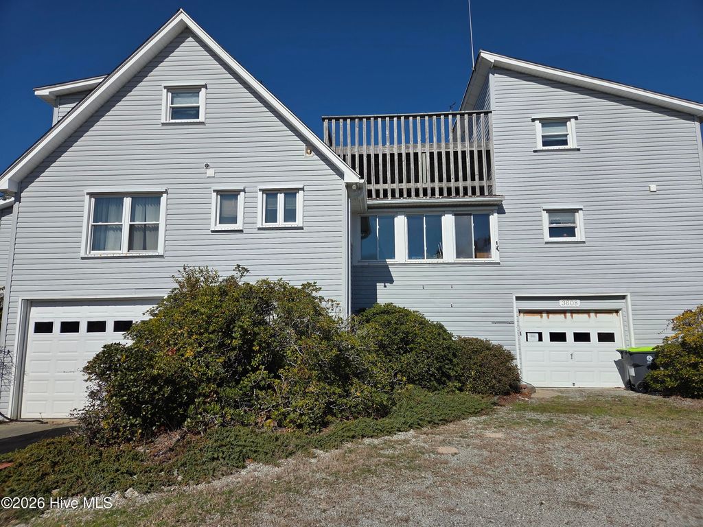 Photo of 3608 Shoreline Drive, Oak Island, NC 28465 (MLS # 100557343)