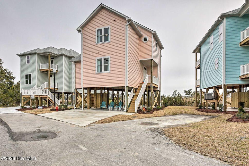 Photo of 124 Salt Marsh Way, Atlantic Beach, NC 28512 (MLS # 100609557)