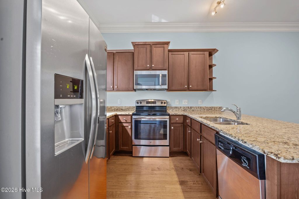 Photo of 4916 Exton Park Loop, Castle Hayne, NC 28429 (MLS # 100584837)