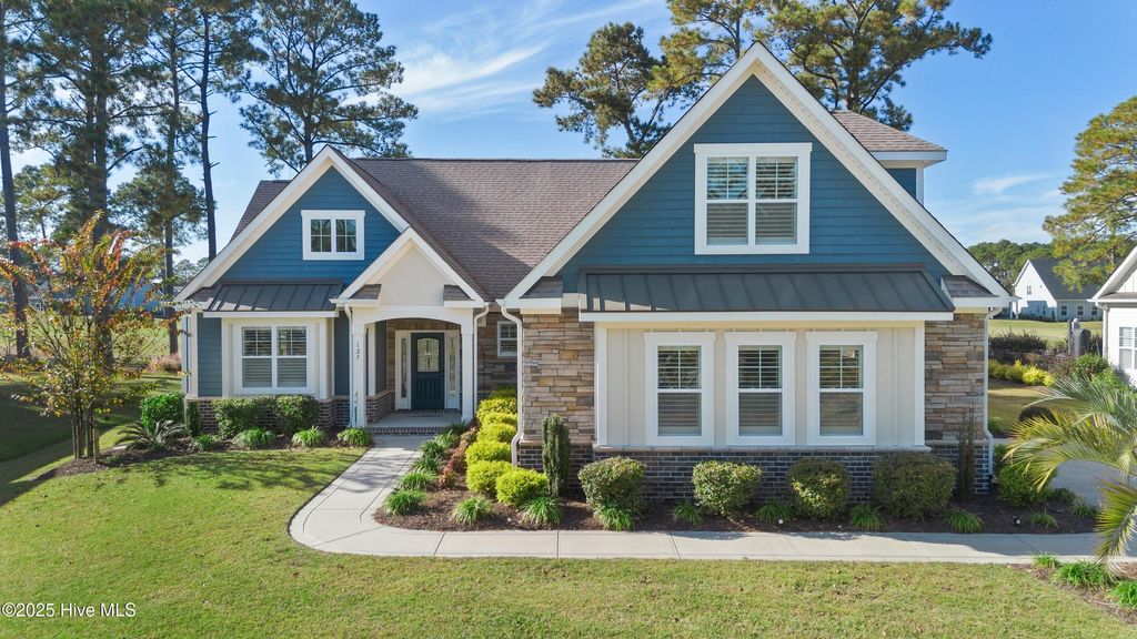 Photo of 127 Clubhouse Road, Sunset Beach, NC 28468 (MLS # 100541782)