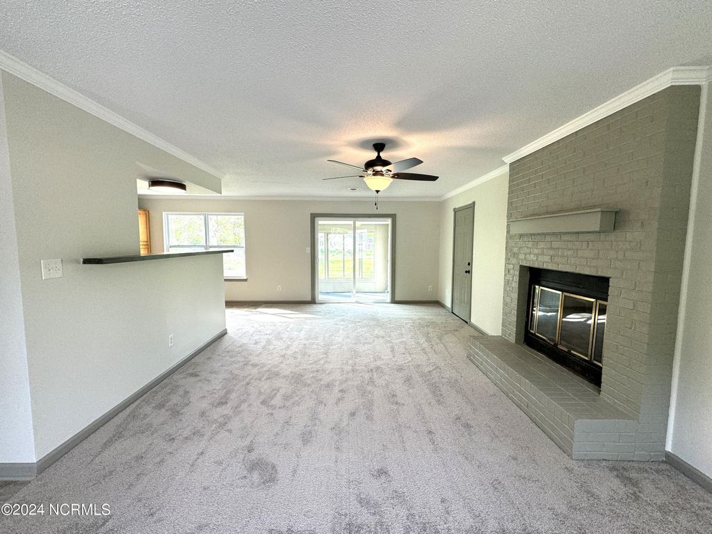 Photo of 833 Mill River Road, Jacksonville, NC 28540 (MLS # 100590039)