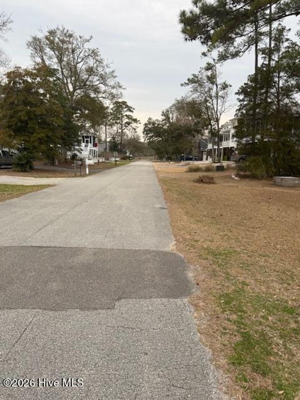 Photo of 126 NW 20th Street, Oak Island, NC 28465 (MLS # 100557739)