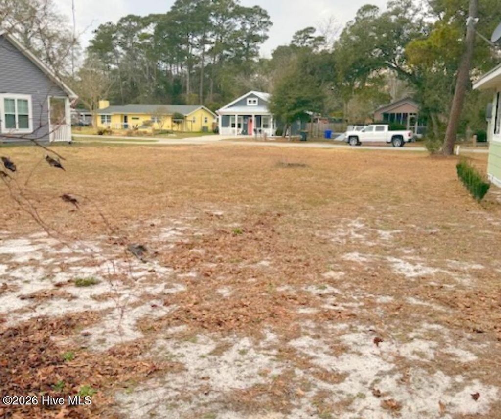 Photo of 126 NW 20th Street, Oak Island, NC 28465 (MLS # 100557739)