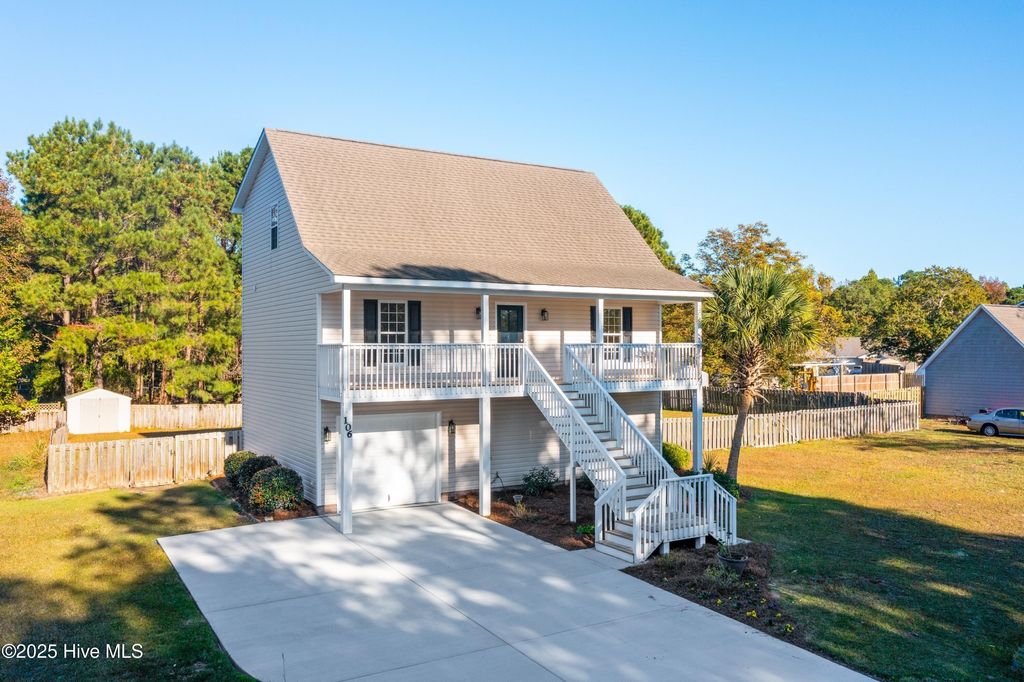 Photo of 106 Dolphin Drive, Hampstead, NC 28443 (MLS # 100540985)