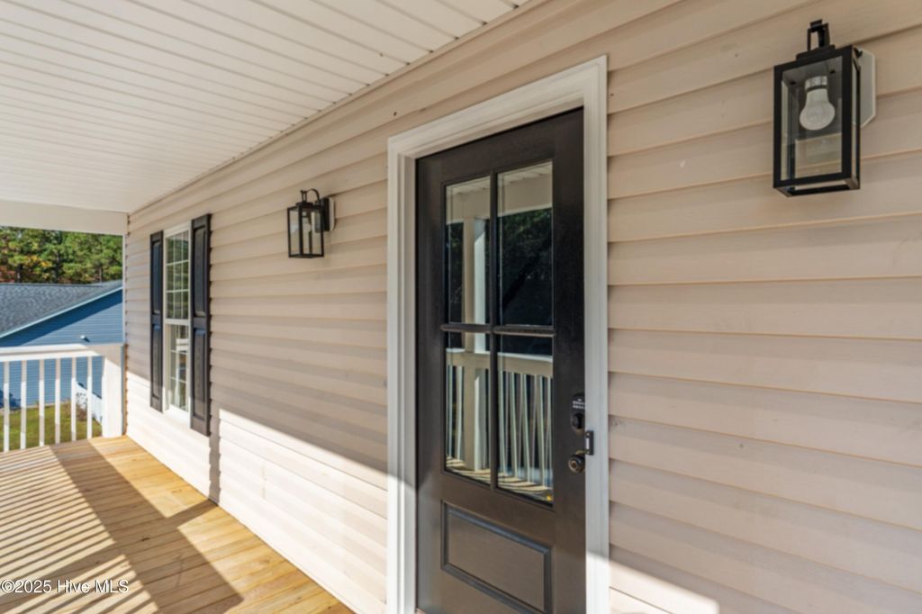 Photo of 106 Dolphin Drive, Hampstead, NC 28443 (MLS # 100540985)