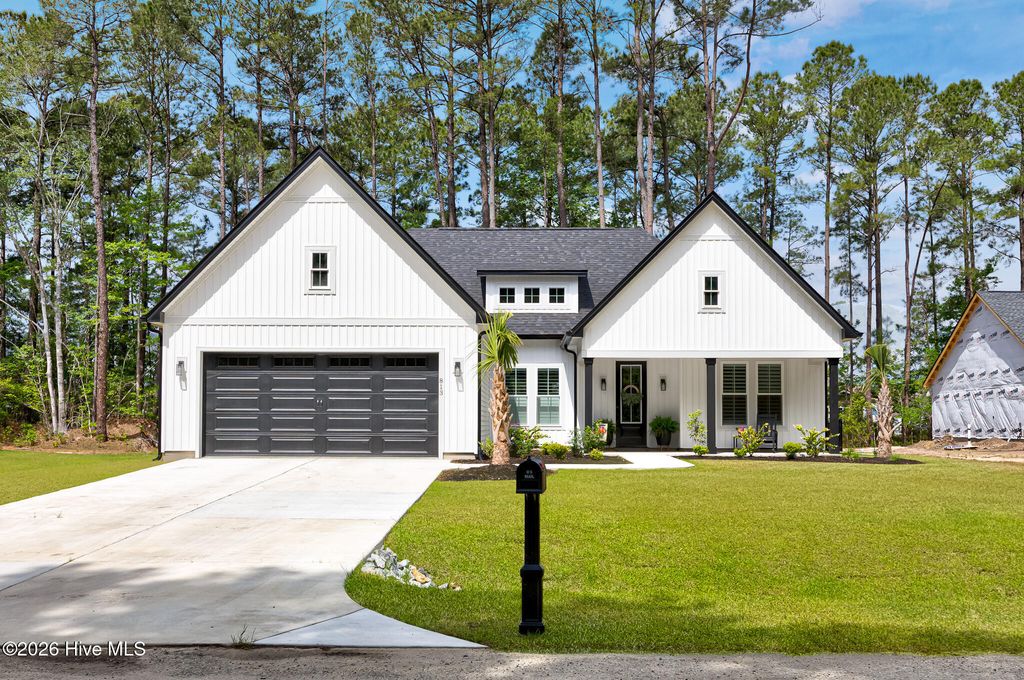 Photo of 813 Boundaryline Drive NW, Calabash, NC 28467 (MLS # 100572181)