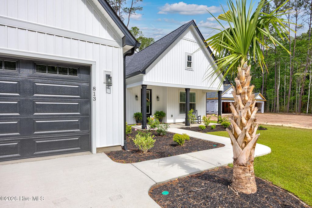 Photo of 813 Boundaryline Drive NW, Calabash, NC 28467 (MLS # 100572181)