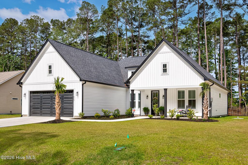 Photo of 813 Boundaryline Drive NW, Calabash, NC 28467 (MLS # 100572181)