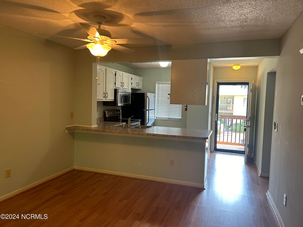 Photo of 3625 Saint Johns Court #Unit 25b, Wilmington, NC 28403 (MLS # 100562197)