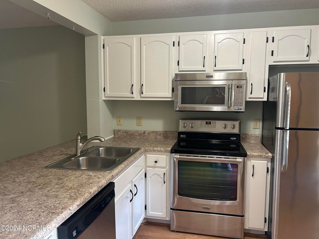 Photo of 3625 Saint Johns Court #Unit 25b, Wilmington, NC 28403 (MLS # 100562197)