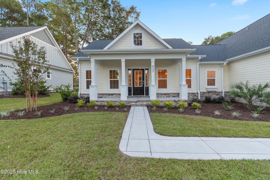 Photo of 623 Wisteria Lane, Sunset Beach, NC 28468 (MLS # 100533106)