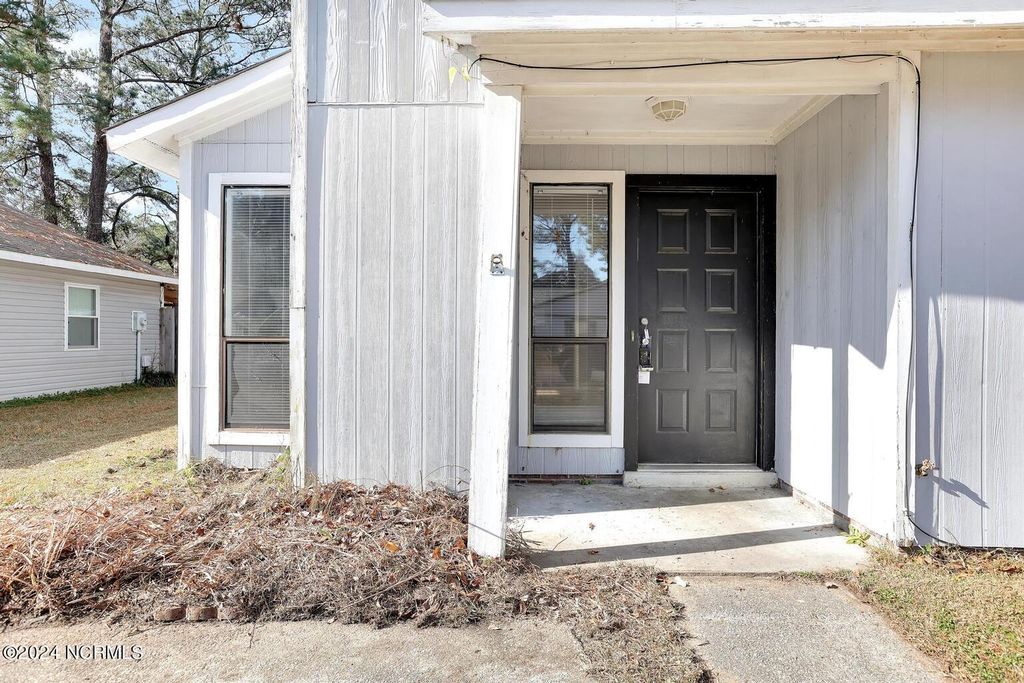 Photo of 113 Village Circle, Jacksonville, NC 28546 (MLS # 100565650)