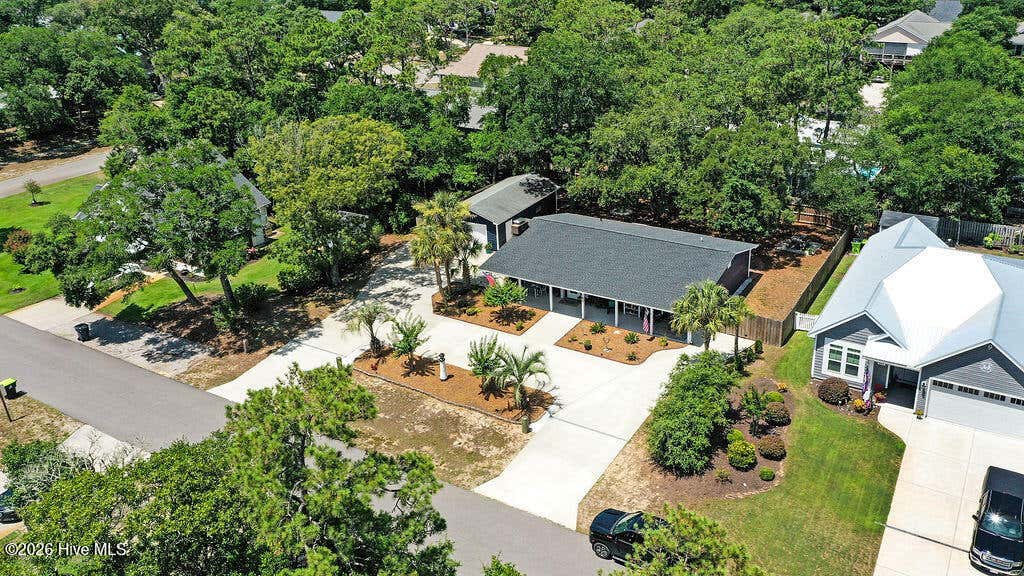 Photo of 103 NW 25th Street, Oak Island, NC 28465 (MLS # 100583916)