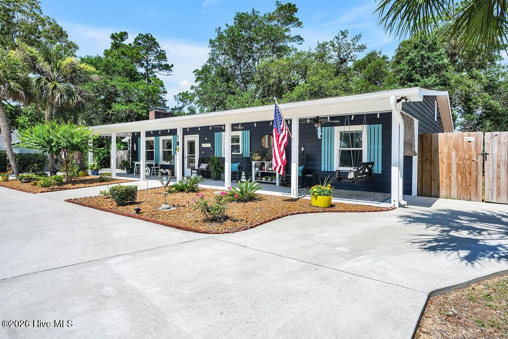 Photo of 103 NW 25th Street, Oak Island, NC 28465 (MLS # 100583916)