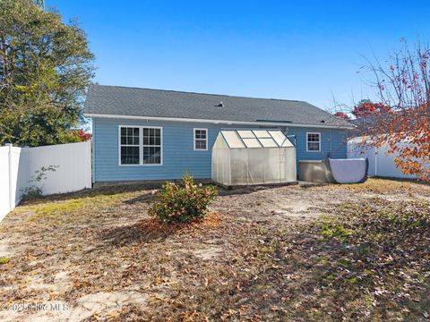 Tiny photo for 161 NE 7th Street, Oak Island, NC 28465 (MLS # 100545371)
