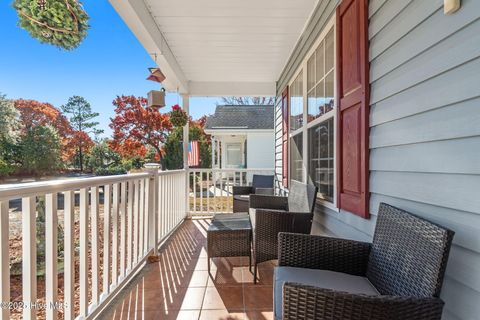 Tiny photo for 161 NE 7th Street, Oak Island, NC 28465 (MLS # 100545371)