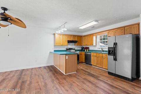 Tiny photo for 161 NE 7th Street, Oak Island, NC 28465 (MLS # 100545371)