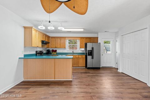 Tiny photo for 161 NE 7th Street, Oak Island, NC 28465 (MLS # 100545371)