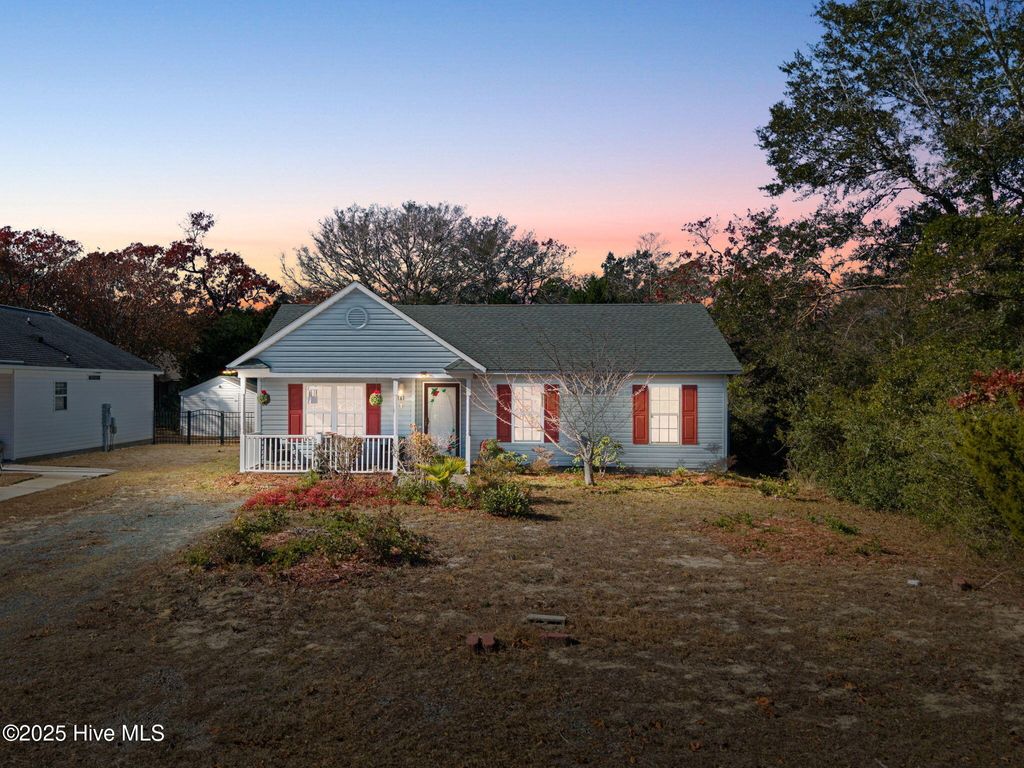 Photo of 161 NE 7th Street, Oak Island, NC 28465 (MLS # 100545371)