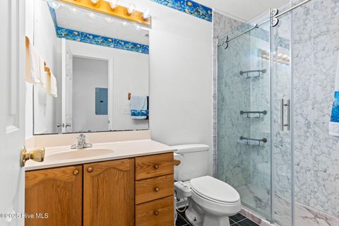 Tiny photo for 161 NE 7th Street, Oak Island, NC 28465 (MLS # 100545371)