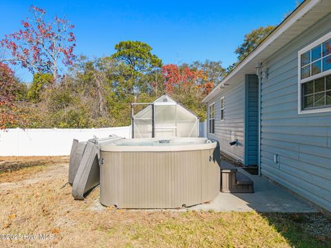 Tiny photo for 161 NE 7th Street, Oak Island, NC 28465 (MLS # 100545371)