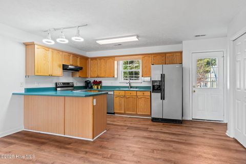 Tiny photo for 161 NE 7th Street, Oak Island, NC 28465 (MLS # 100545371)