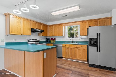 Tiny photo for 161 NE 7th Street, Oak Island, NC 28465 (MLS # 100545371)