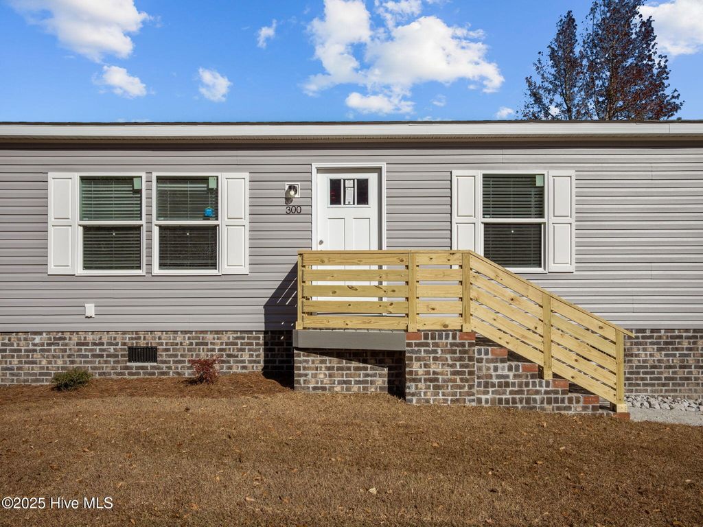 Photo of 300 N Red Maple Court, Swansboro, NC 28584 (MLS # 100541936)