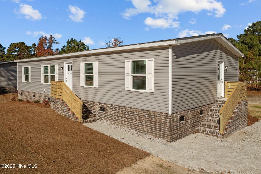 Photo of 300 N Red Maple Court, Swansboro, NC 28584 (MLS # 100541936)