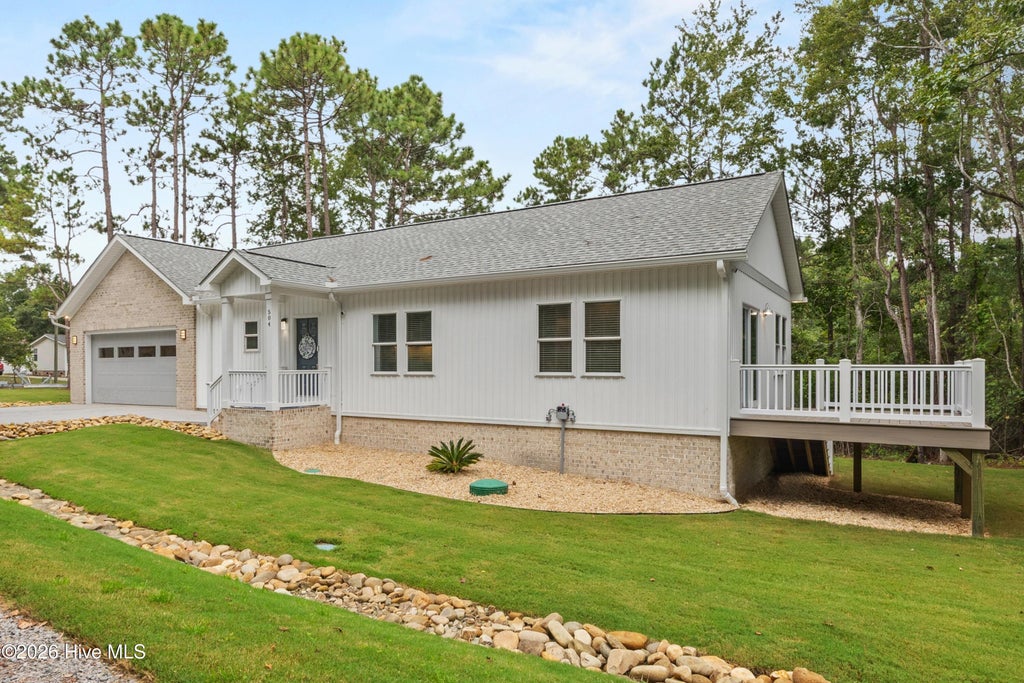 Photo of 504 Cypress Circle SW, Shallotte, NC 28470 (MLS # 100606050)