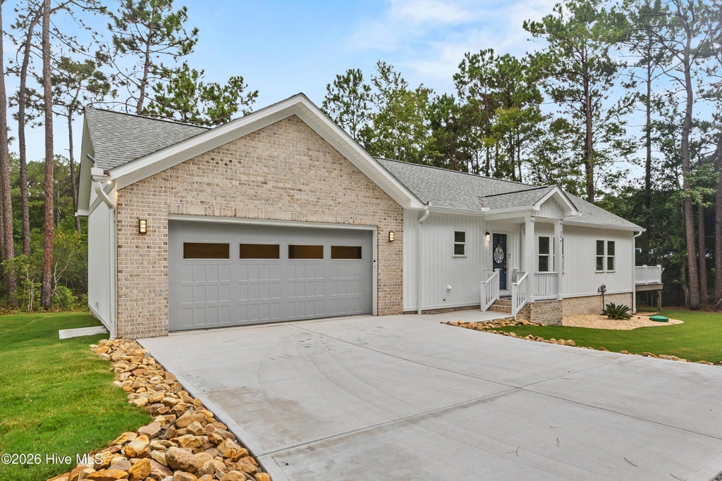 Photo of 504 Cypress Circle SW, Shallotte, NC 28470 (MLS # 100606050)