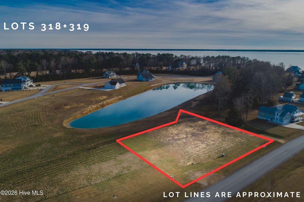 Photo of 727 W Burton Farm Drive, Minnesott Beach, NC 28510 (MLS # 100534596)