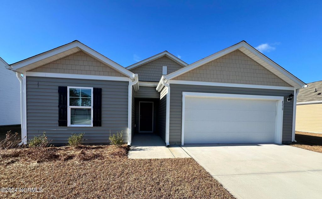 Photo of 8219 E Highcroft Drive NE, Leland, NC 28451 (MLS # 100565972)