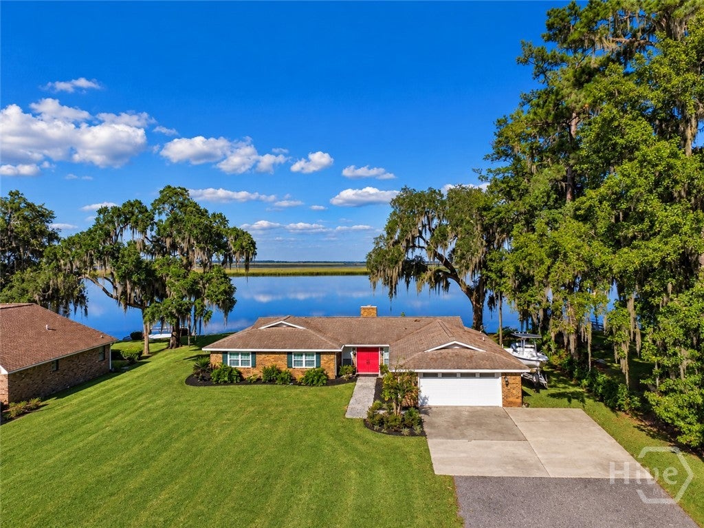 Photo of 30 Williamson Drive, Richmond Hill, GA 31324 (MLS # SA366625)