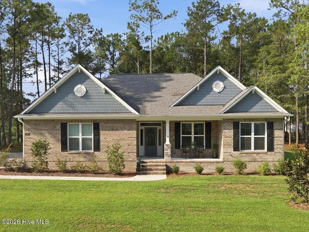 Photo of 579 Hearthside Drive SE, Bolivia, NC 28422 (MLS # 100597180)
