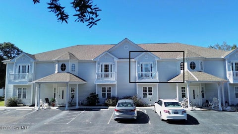 Photo of 414 Mcglamery Street #Apt 15, Oak Island, NC 28465 (MLS # 100612358)