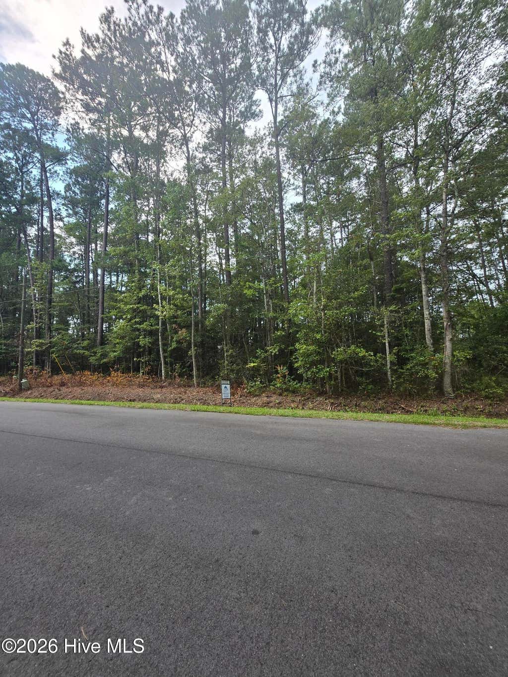 Photo of 6 Myrtlewood Drive SW, Carolina Shores, NC 28467 (MLS # 100596646)