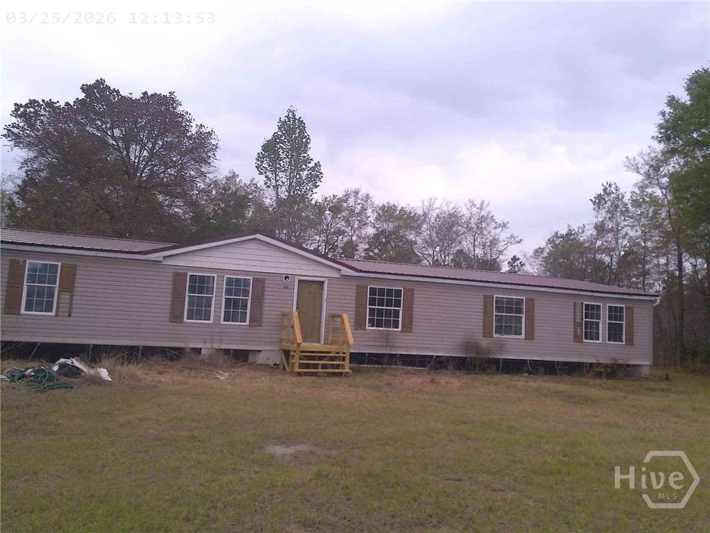 Photo of 68 Pine Tar Lane NE, Ludowici, GA 31316 (MLS # SA352119)